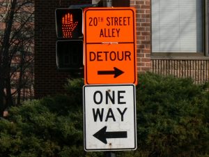 One way sign Detour